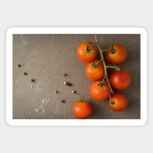 Top view of a bunch of natural cherry tomatoes on cement background with copy space Sticker